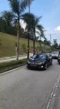 Earlier,  r. Mahathir bin Mohamad arrives at the National Palace in his car, with Proton 2020 plate.