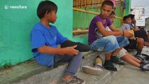 One-legged boy performs skateboard tricks after receiving prosthetic leg