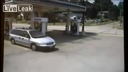 Runaway Semi flips into a gas station