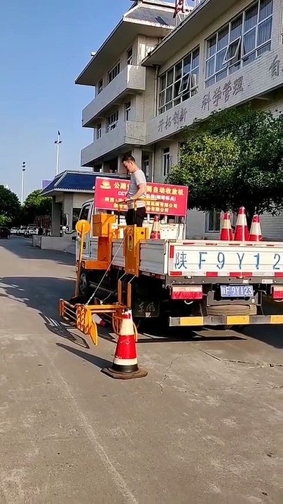 Tool to pick up traffic cones