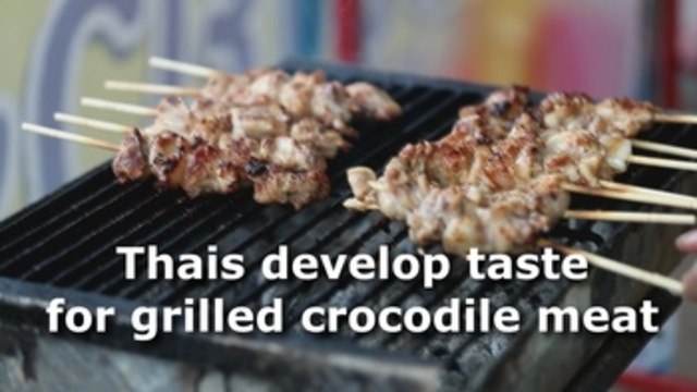 Thais develop taste for grilled crocodile meat