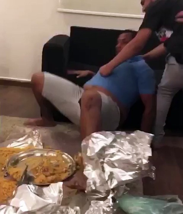 Friends joking with friend during lunch.. Afraid of cobra