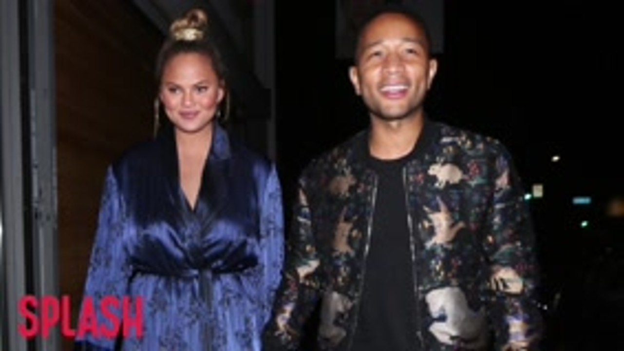 Chrissy Teigen says John Legend is an 'aggressive cuddler'