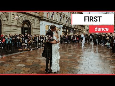 Newlywed couple enjoy first dance in Scotland's busiest shopping street | SWNS TV