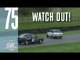 Touring cars in wild sliding action at Goodwood
