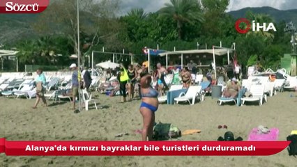 Alanya'da kırmızı bayraklar bile turistleri durduramadı