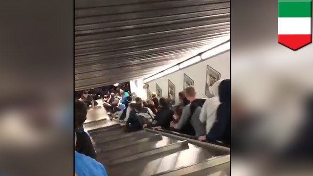 Escalator in Rome metro malfunctions , injuring dozens
