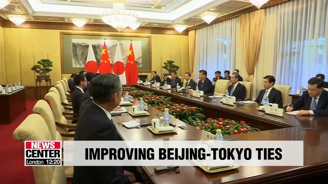 Japanese Prime Minister Abe in China for first time in 7 years to forge closer ties with Beijing