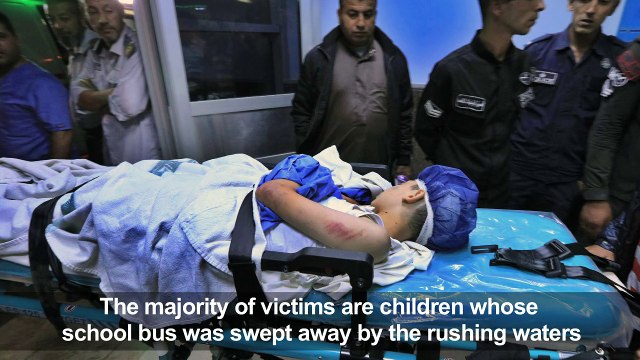 Relatives of victims in Dead Sea tragedy wait outside a morgue