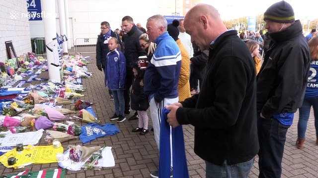 Leicester City fans lay flowers at King Power after owner's helicopter crashes