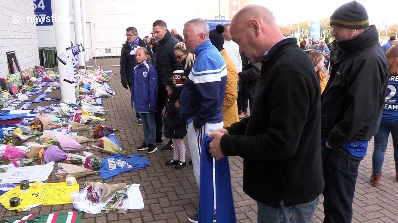 Leicester City fans lay flowers at King Power a...