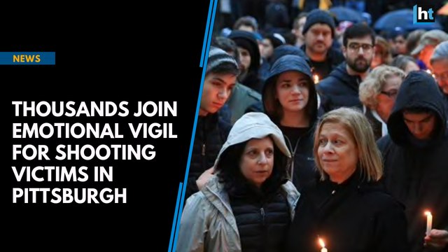 Thousands join emotional vigil for shooting victims in Pittsburgh