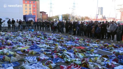 Leicester fans light candles for club owner after helicopter crash