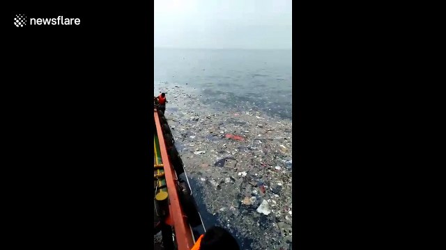 Large amounts of debris and passengers' possessions floating in the sea after Lion Air plane crash in Indonesia