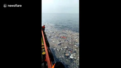 Large amounts of debris and passengers' possessions floating in the sea after Lion Air plane crash in Indonesia