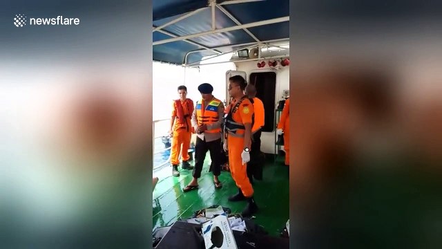 Rescuers find child's body after Lion Air plane crash in Indonesia
