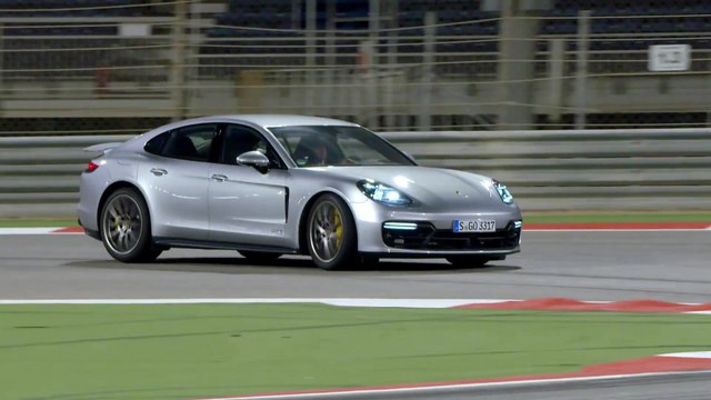 Porsche Panamera GTS Night driving on the track in GT-Silver Metallic