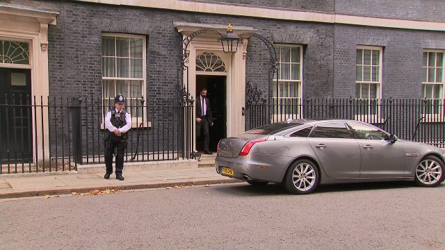Theresa May leaves Downing Street ahead of Budget