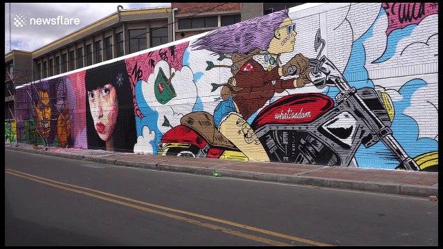 Graffiti artists brighten up industrial zone in Bogota with colourful murals
