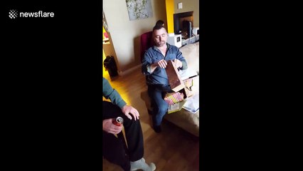 Man receives emotional birthday surprise from stepchildren