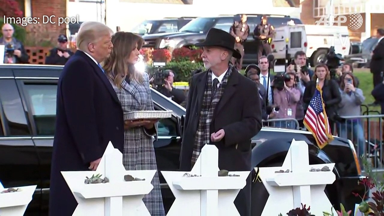 Trump visits Pittsburgh synagogue after shooting amid protests