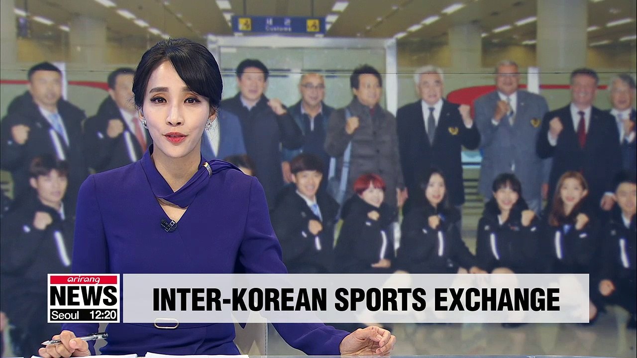 Delegation from S. Korea's World Taekwondo Federation arrives for performance in N. Korean capital