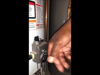Home Inspector Shows Hot Water Heater Inspection