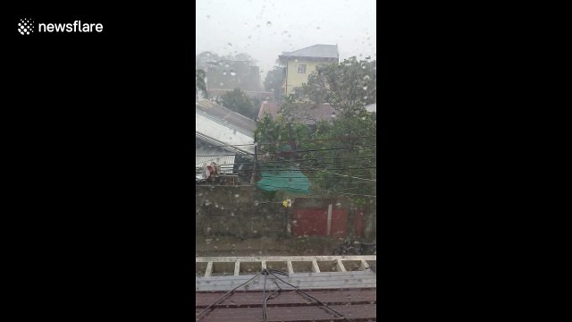 Typhoon leaves six dead and dozens feared trapped in landslides in northern Philippines