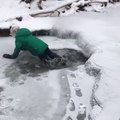 Funny baby fell down in ice water hole on swimming point