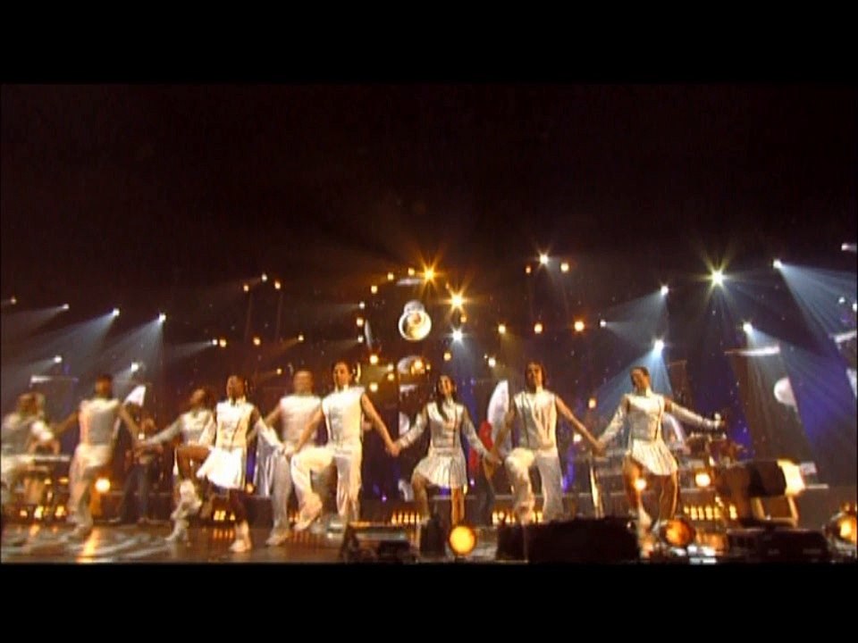 LORIE : AU-DELÀ DES FRONTIÈRES (VISION DE LORIE DE LA SCENE) – LIVE TOUR WEEK END 2004 – [ÉDITION COLLECTOR LIMITÉE]