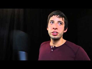 Example speaks after presenting Best Album at the 2012 Q Awards