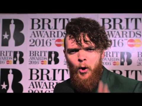 Jack Garratt hits the Brits 2016 red carpet with James Barr