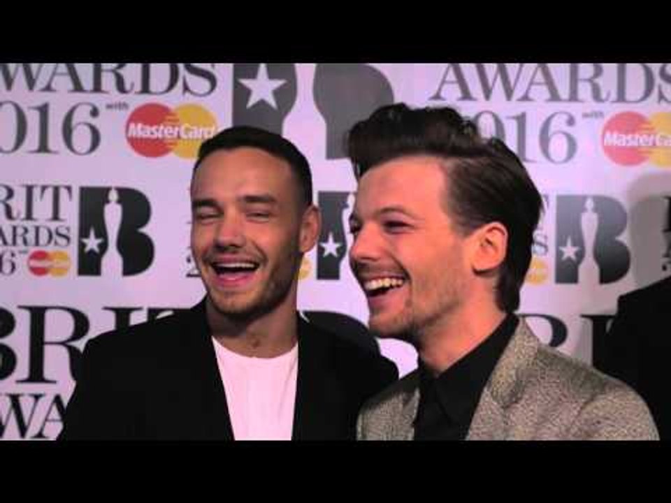 Liam and Louis from One Direction join James Barr on the Brits 2016 red carpet