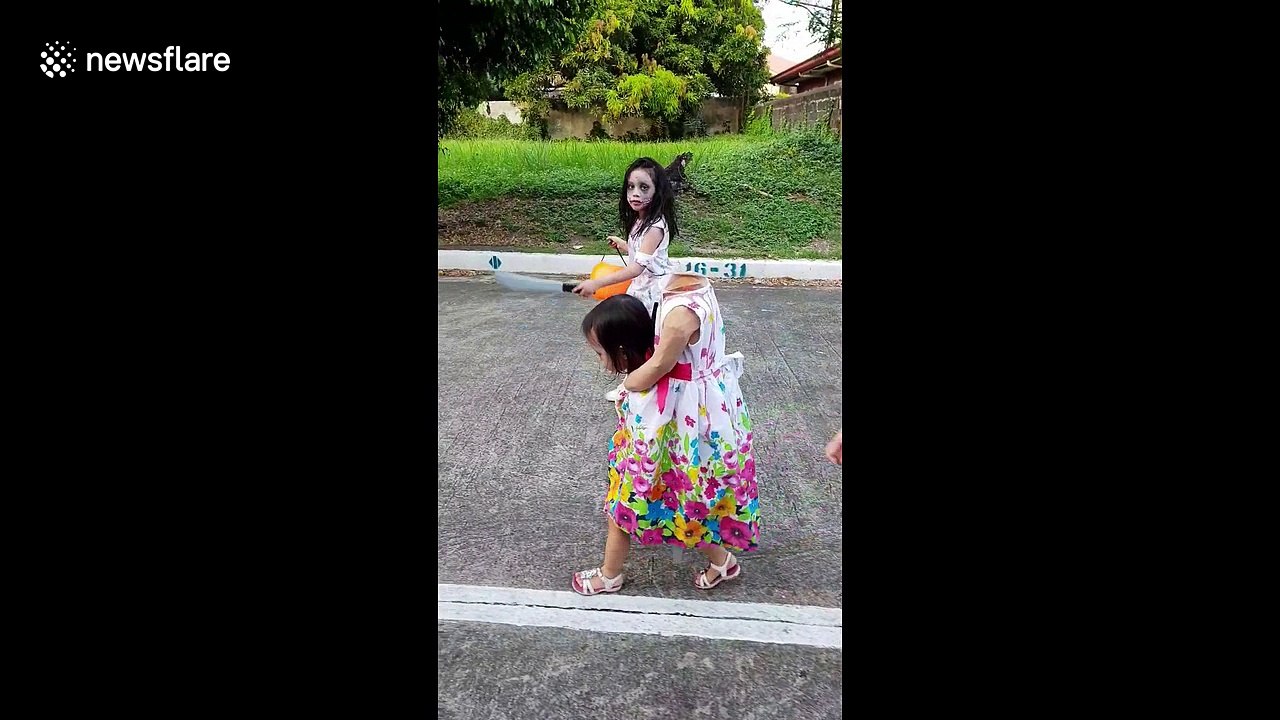 This 'headless' little girl is ready for Halloween