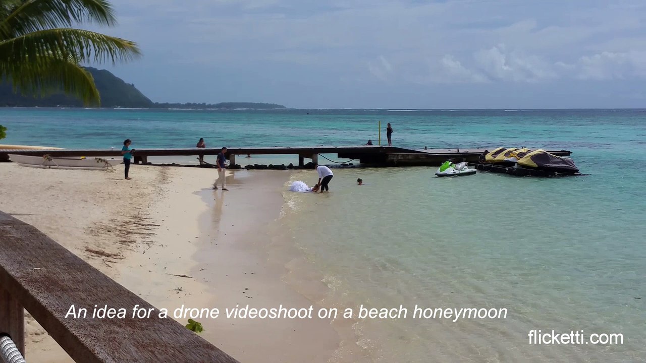 An idea for drone videoshoot on a beach honeymoon