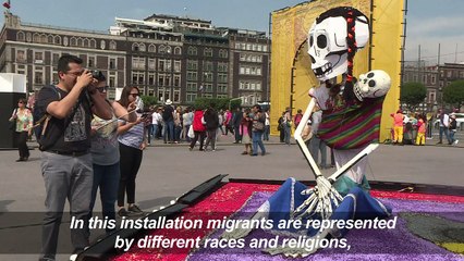 Migrants honored at Mexico City's Day of the Dead offering