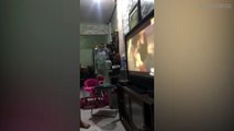 Woman Gets Carried Away Watching TV Drama