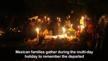 Mexicans celebrate Day of the Dead with altar offerings