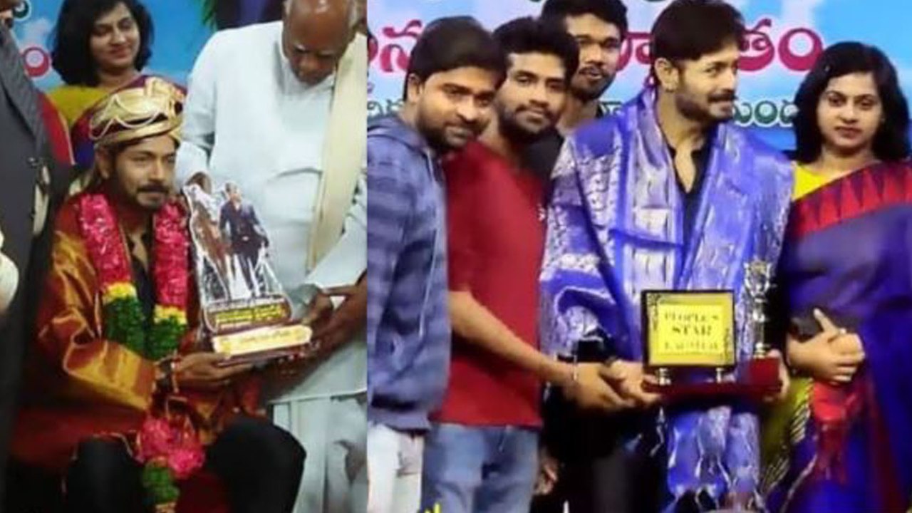 Kaushal Manda Receives A Award From Ex Chief Minister Rosaiah