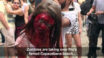 Revellers take part in the annual Zombie Walk in Rio de Janeiro