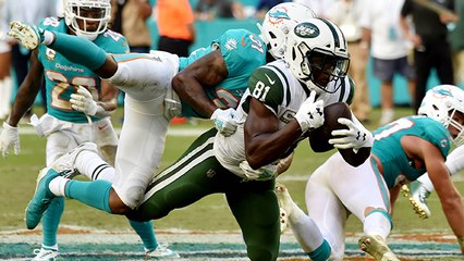 Qunicy Enunwa carries a pile of Dolphins for HUGE gain