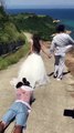 Photographer slides to get his desired shot