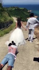 Photographer slides to get his desired shot