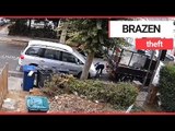 Brazen thieves caught stealing parked car by towing it away in broad daylight | SWNS TV