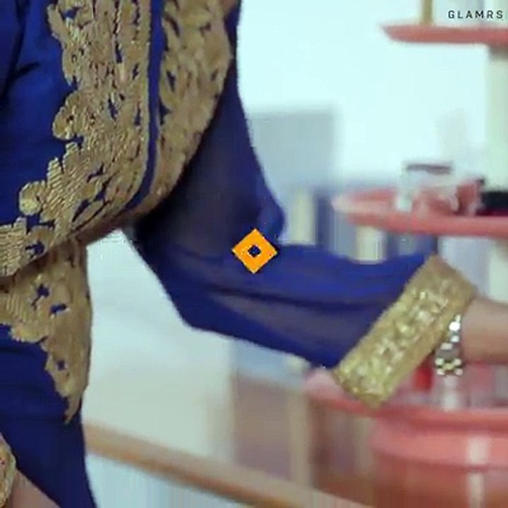 Infuse some festive spirit into your hairdo with this fun and easy BRAIDED BUN!