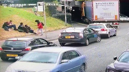 Hapless truck driver gets stuck under low bridge in UK's Rochdale