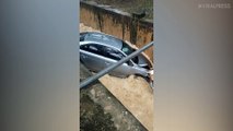 Car Washed Away After Skidding Into Storm Drain