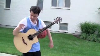 Genius Man Playing Basketball And Guitar Together