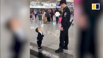 Cute boy just wants a hug from airport security guard in China