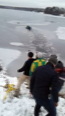 Man Rescues Dog Fallen Through Ice
